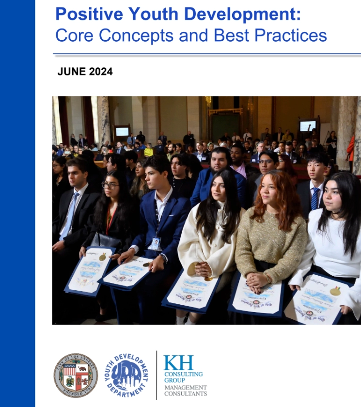 Cover of report titled "Positive Youth Development: Core Concepts and Best Practices." The cover of the report features members of the LA City Youth Council in the City Hall Council Chambers. 