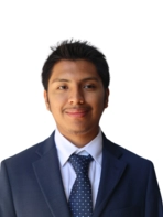Photo of young man in suit and tie with short hair
