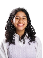 Young woman with curly hair in white blouse