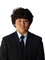 Young man with curly hair in business attire