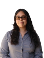 Young woman with glasses and button up shirt